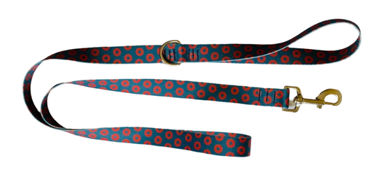 Dog leash with red floral pattern on a white background